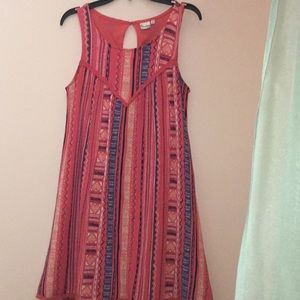 pink dress with vertical patterns